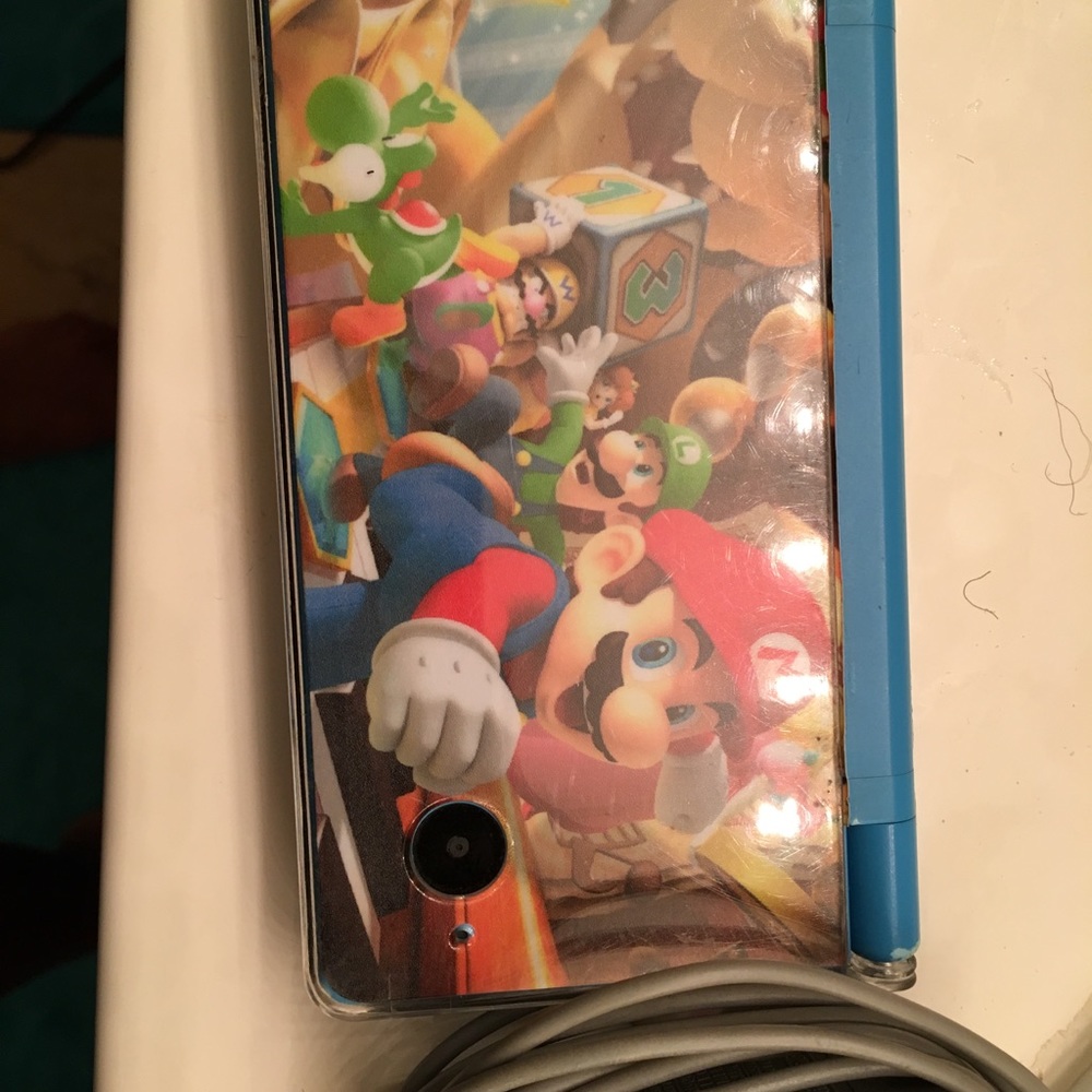 Nintendo DSI with Mario case and Mario kart game